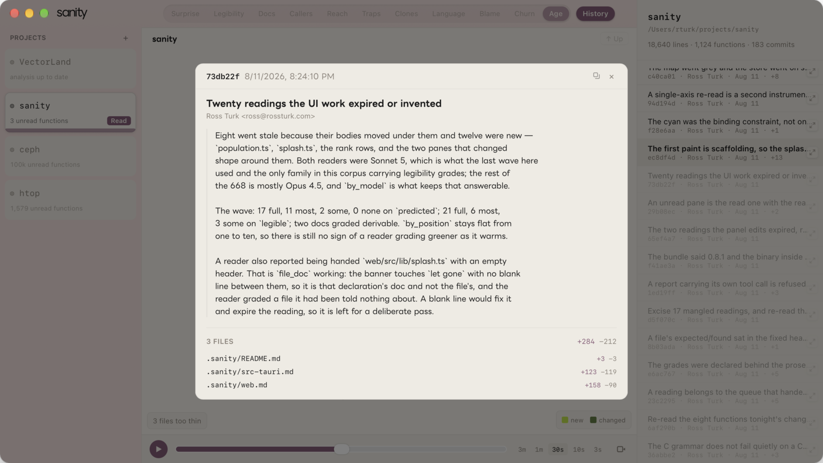 A commit opened over the map: its message and the files it touched, with line counts.